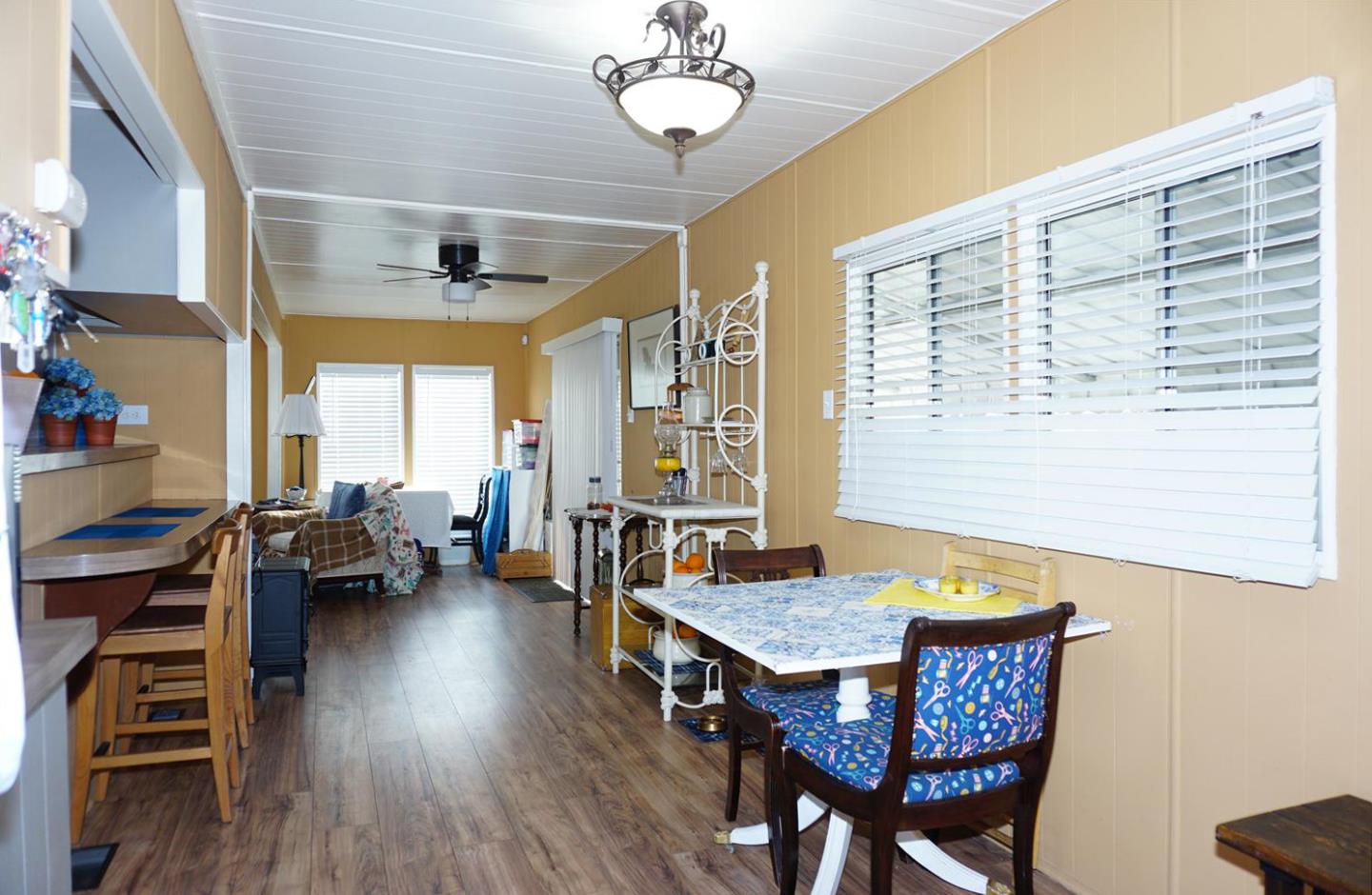 2150 Almaden Road, Unit 62 San Jose, CA 95125 - Photo 13 of 38 a view of a dining room with furniture window and wooden floor