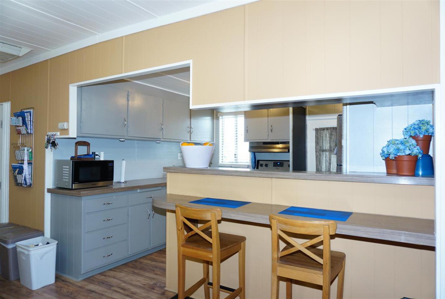 2150 Almaden Road, Unit 62 San Jose, CA 95125 - Photo 14 of 38 a kitchen with a table and chairs in it