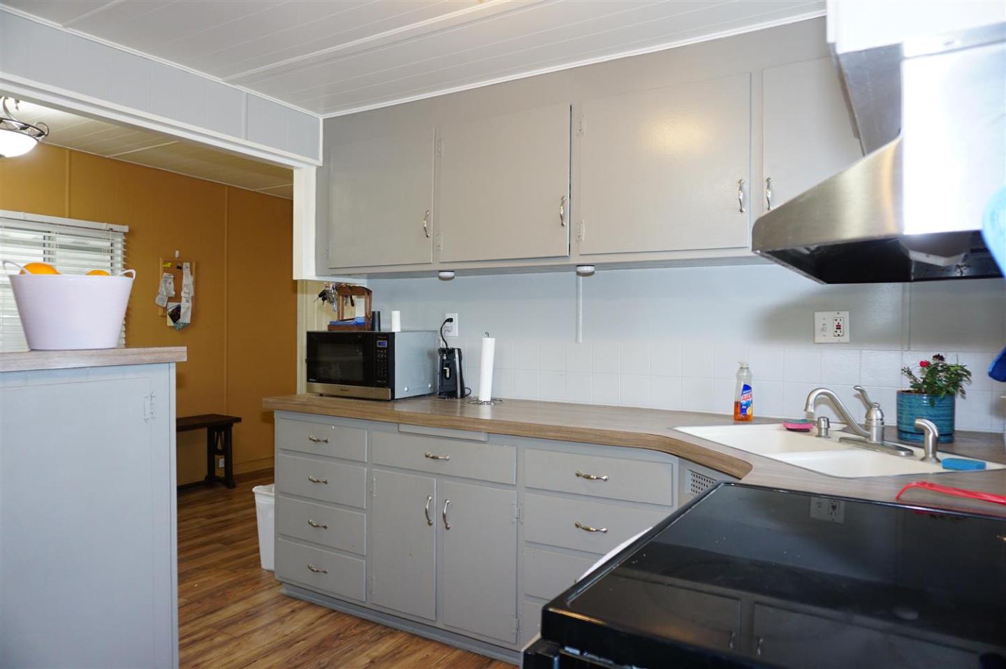 2150 Almaden Road, Unit 62 San Jose, CA 95125 - Photo 16 of 38 a kitchen with a sink cabinets and wooden floor
