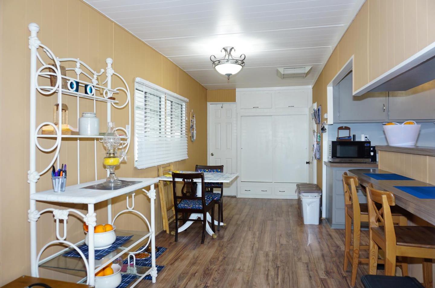 2150 Almaden Road, Unit 62 San Jose, CA 95125 - Photo 18 of 38 a view of a dining room with furniture and wooden floor