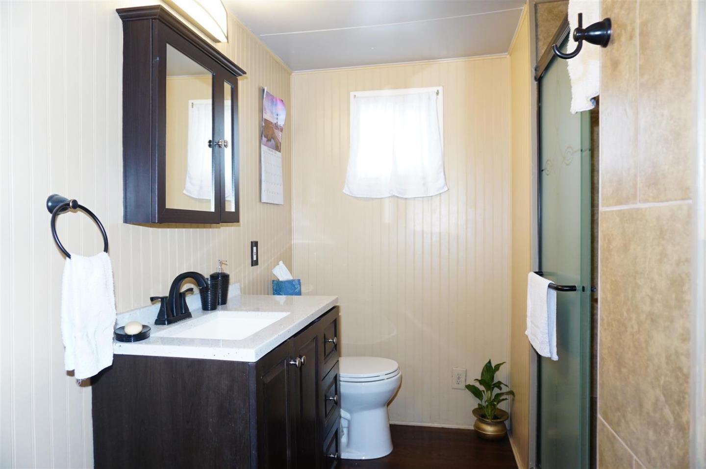 2150 Almaden Road, Unit 62 San Jose, CA 95125 - Photo 24 of 38 a bathroom with a sink toilet and vanity