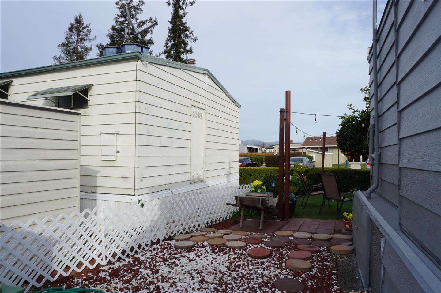 2150 Almaden Road, Unit 62 San Jose, CA 95125 - Photo 33 of 38 a view of a chair and table in backyard