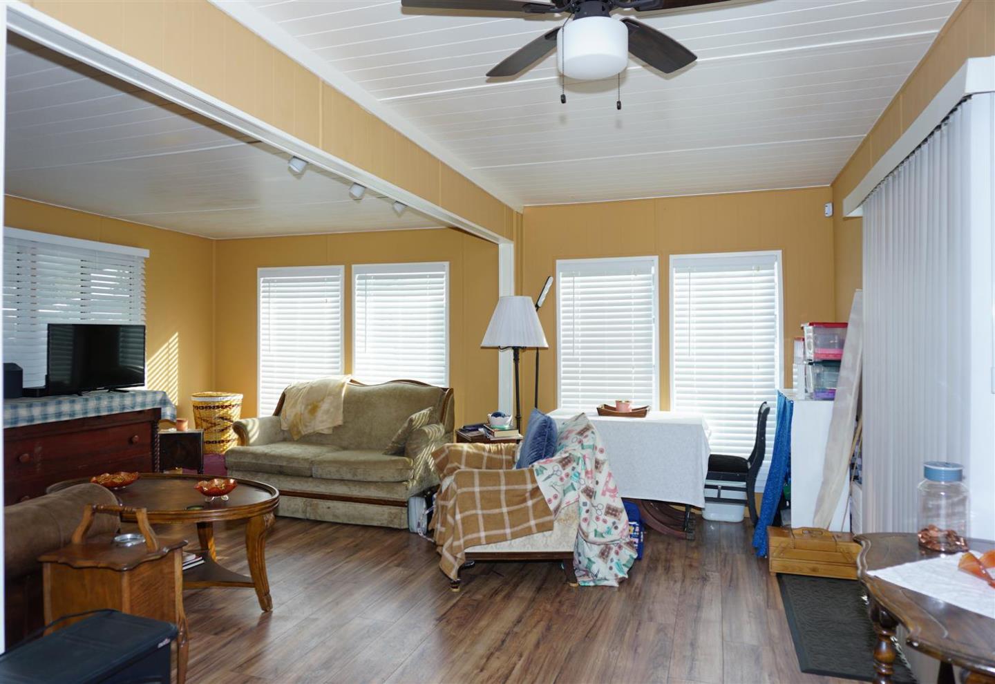 2150 Almaden Road, Unit 62 San Jose, CA 95125 - Photo 7 of 38 a living room with furniture and a flat screen tv