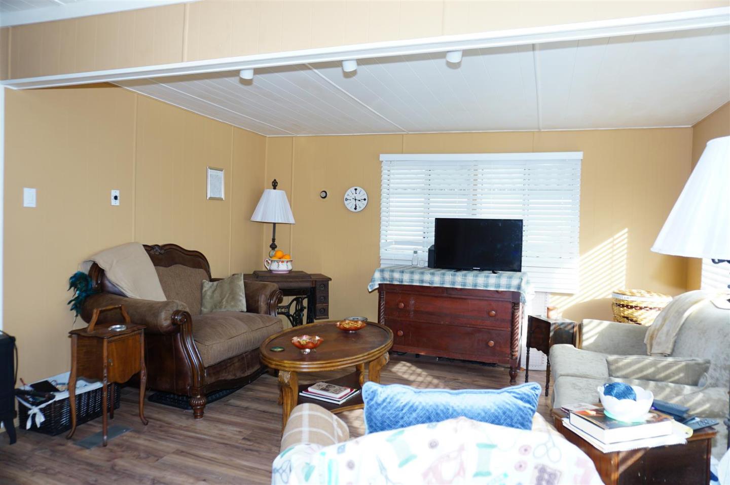 2150 Almaden Road, Unit 62 San Jose, CA 95125 - Photo 9 of 38 a living room with furniture and a fireplace