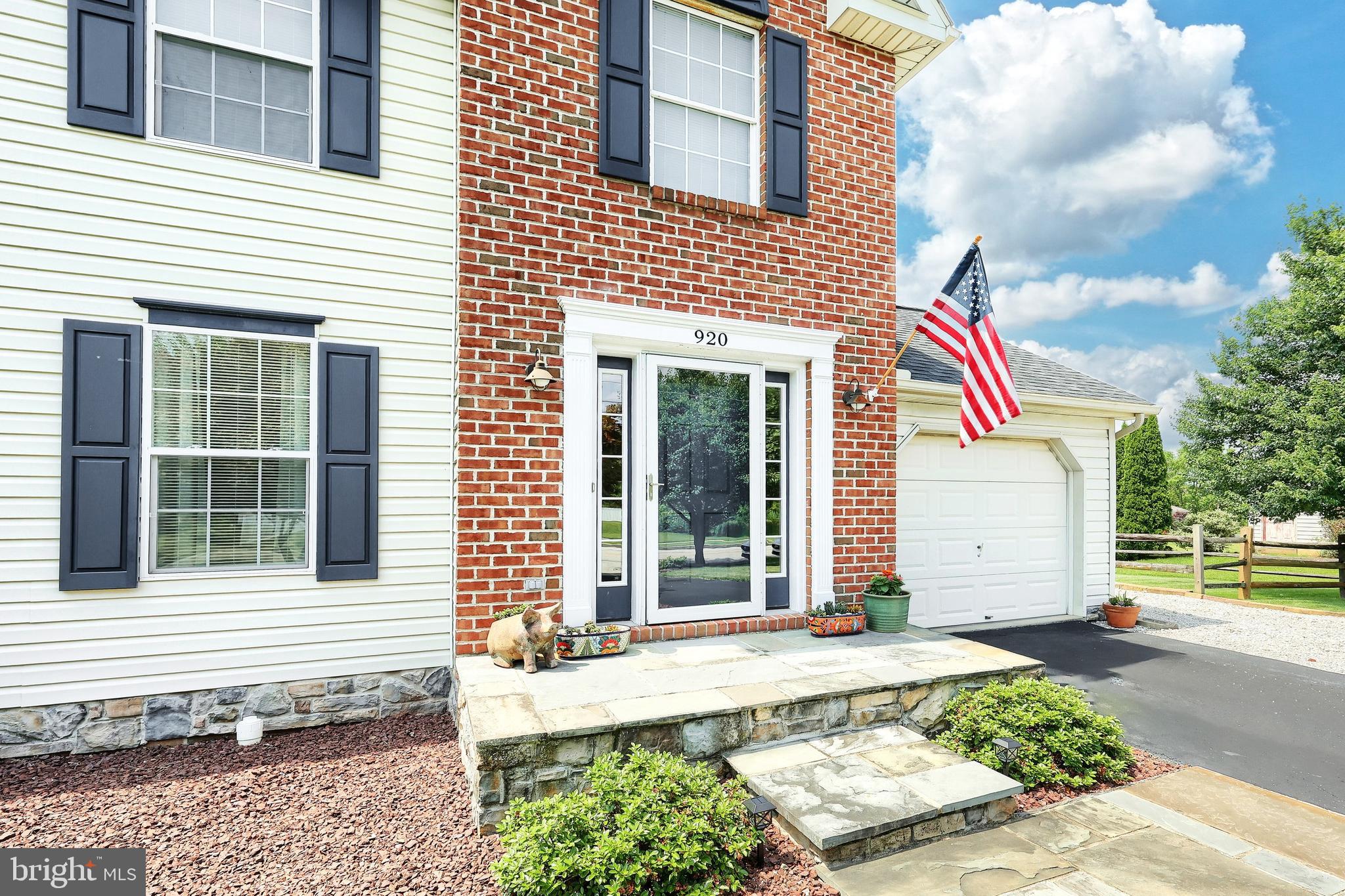 920 Hostetter Road Hanover, PA 17331 - Photo 14 of 49 a front view of a house with a yard