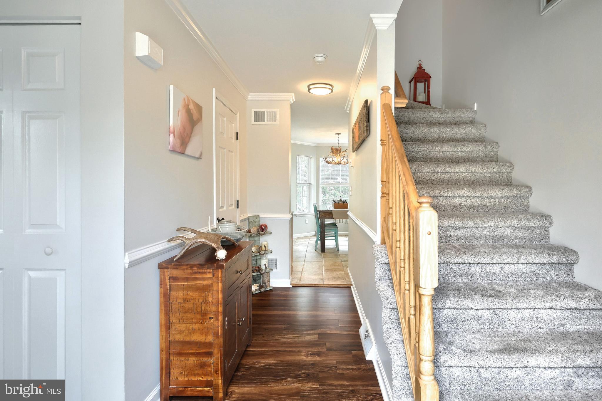 920 Hostetter Road Hanover, PA 17331 - Photo 17 of 49 a view of a hallway with wooden floor and stairs