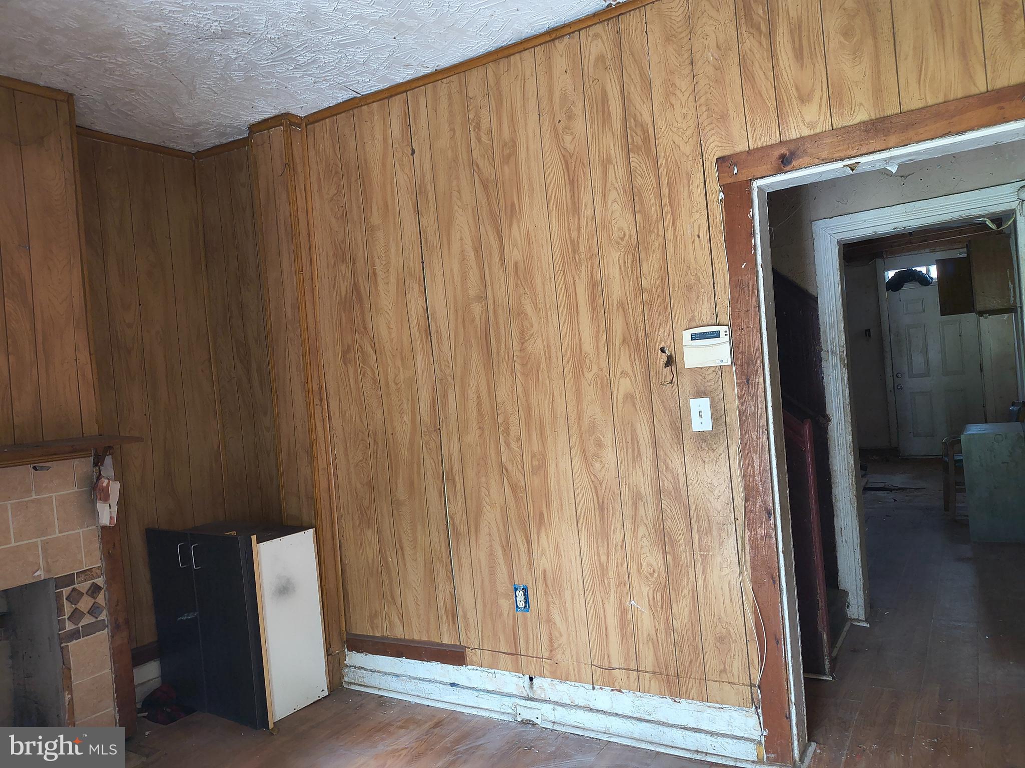1817 Vine Street Baltimore, MD 21223 - Photo 3 of 9 a view of a utility room with a door