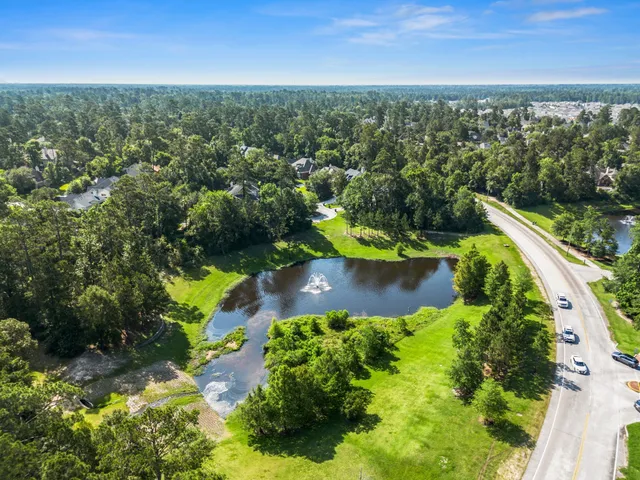 an aerial view of lake residential house with outdoor space