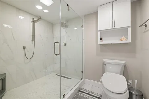 a bathroom with a double vanity sink and mirror