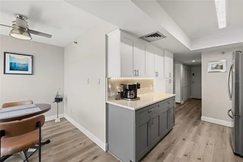 a kitchen with a sink stove and refrigerator