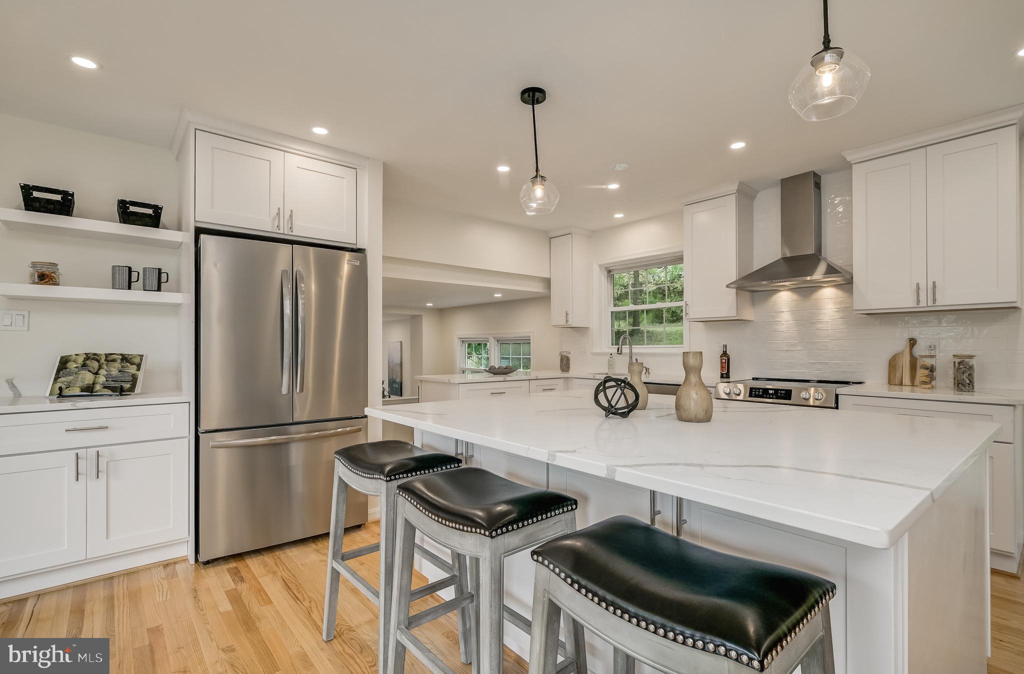 2185 Stratton Drive Potomac, MD 20854 - Photo 6 of 36 Quartz Island and Stainless Steel Appliances