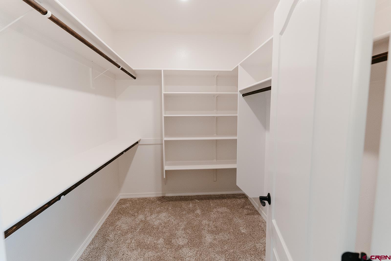 22280 6845 Road Montrose, CO 81403 - Photo 16 of 34 a view of an empty walk in closet