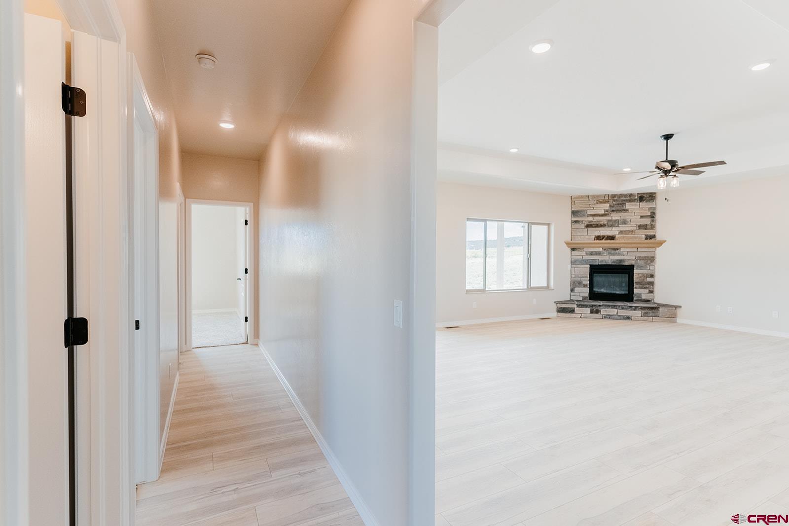 22280 6845 Road Montrose, CO 81403 - Photo 20 of 34 a view of a livingroom with a kitchen