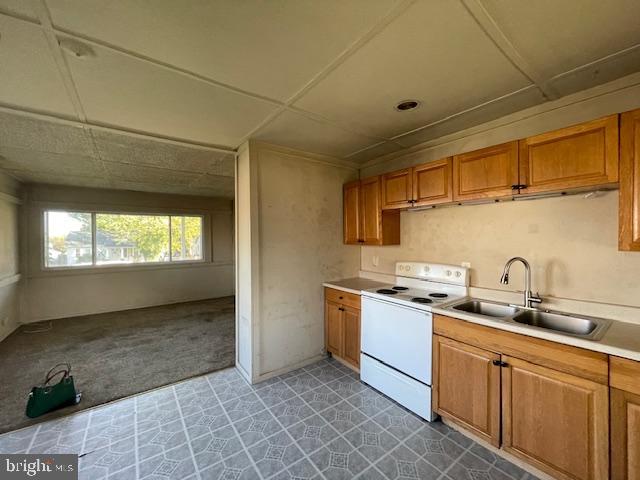 44 Left Wing Drive Middle River, MD 21220 - Photo 3 of 12 a kitchen with stainless steel appliances granite countertop a sink stove and cabinets