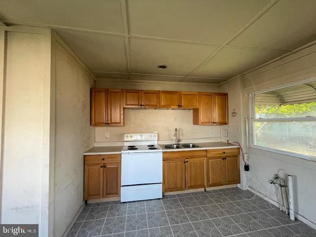 44 Left Wing Drive Middle River, MD 21220 - Photo 4 of 12 a kitchen with a sink a stove and cabinets