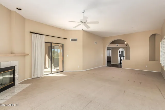 a view of a livingroom with a fireplace