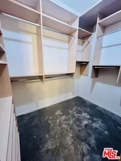 a bathroom with a shower and toilet