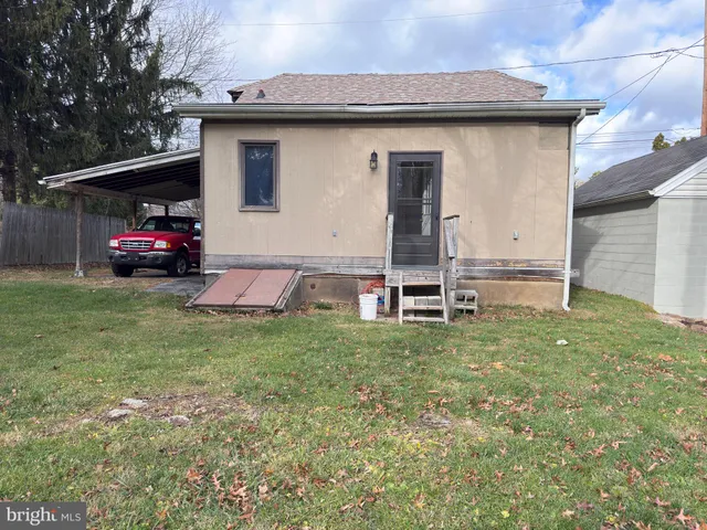 a house view with a garden space