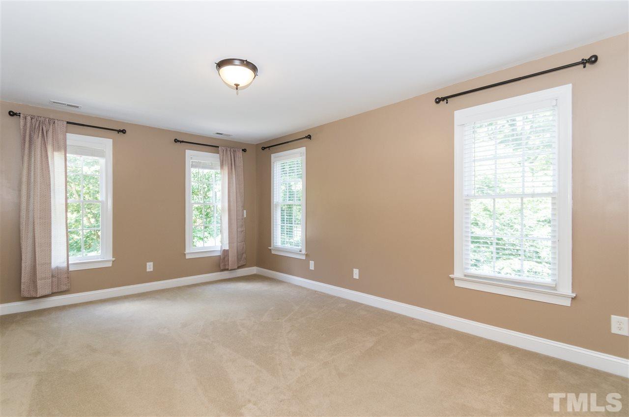 11704 John Allen Road Raleigh, NC 27614 - Photo 11 of 25 a view of an empty room with a window