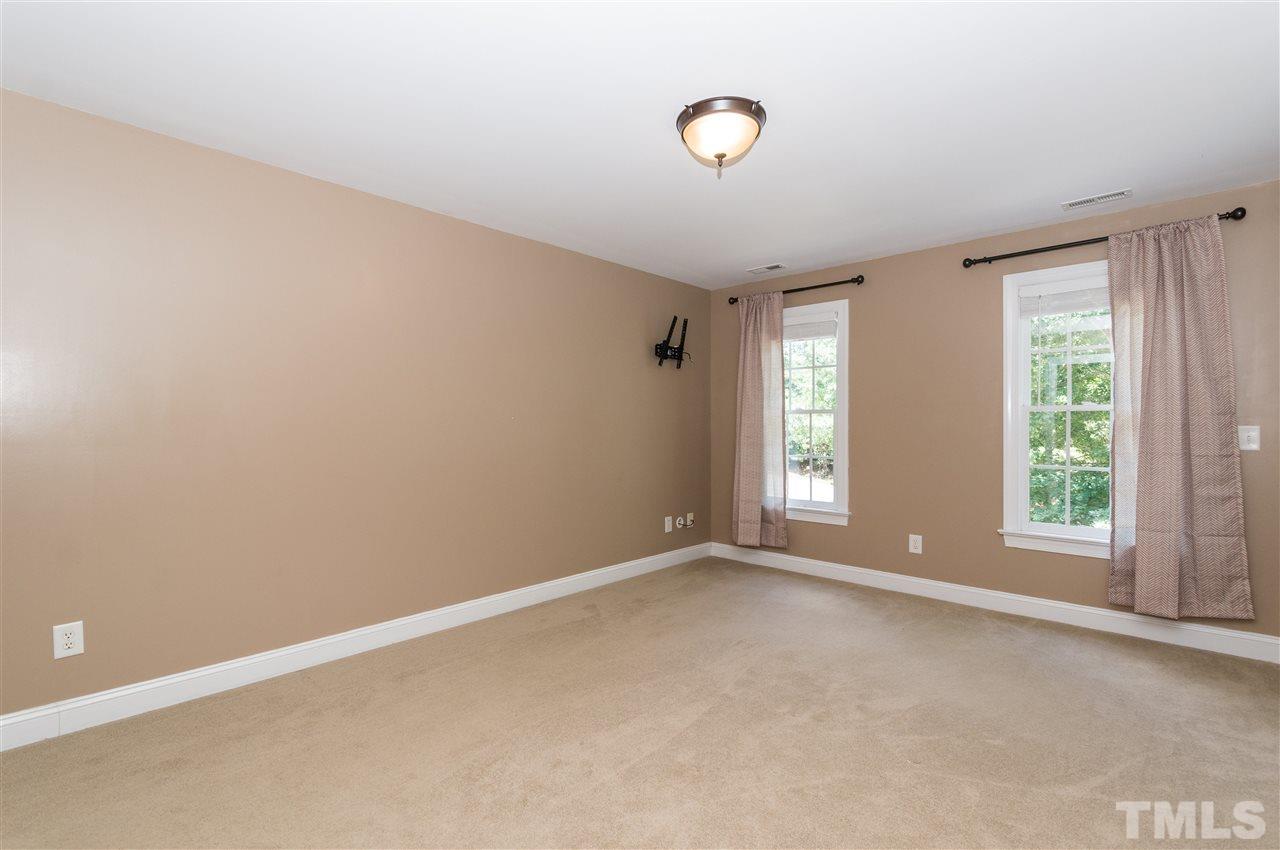 11704 John Allen Road Raleigh, NC 27614 - Photo 12 of 25 an empty room with windows