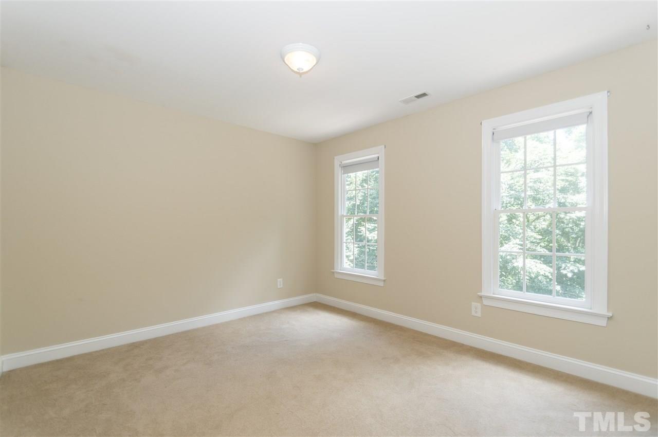 11704 John Allen Road Raleigh, NC 27614 - Photo 15 of 25 an empty room with a window