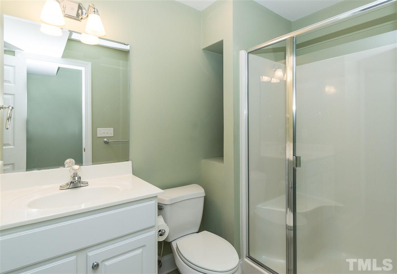 11704 John Allen Road Raleigh, NC 27614 - Photo 20 of 25 a bathroom with a sink toilet and shower