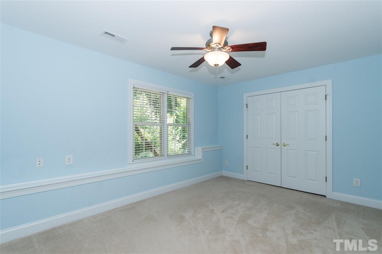 11704 John Allen Road Raleigh, NC 27614 - Photo 21 of 25 a view of an empty room with a window