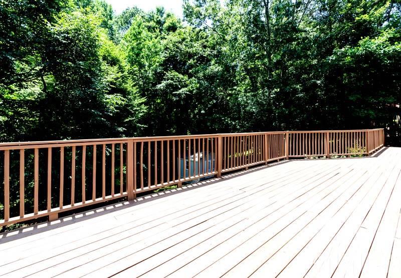11704 John Allen Road Raleigh, NC 27614 - Photo 22 of 25 a view of wooden deck and a forest