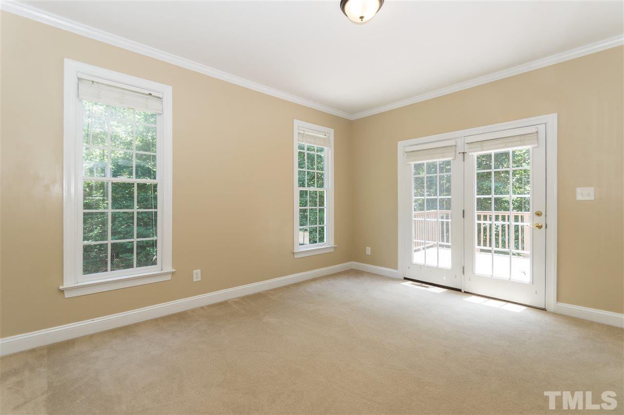 11704 John Allen Road Raleigh, NC 27614 - Photo 7 of 25 an empty room with windows