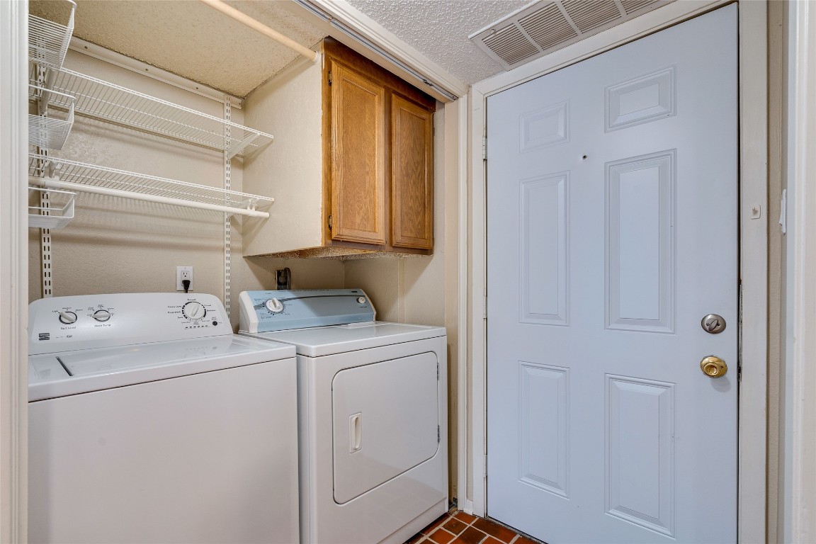 2110 Rio Grande Street, Unit 208 Austin, TX 78705 - Photo 22 of 31 a utility room with dryer and washer