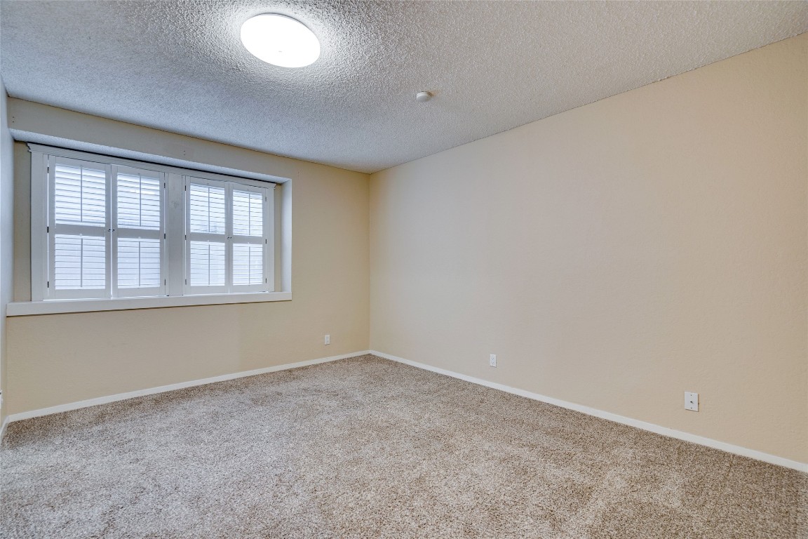 2110 Rio Grande Street, Unit 208 Austin, TX 78705 - Photo 25 of 31 an empty room with a window