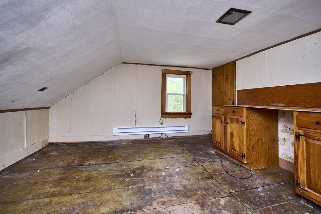 6 Mougin Road Cummington, MA 01026 - Photo 15 of 26 a view of an empty room with a window