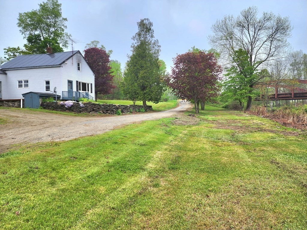 6 Mougin Road Cummington, MA 01026 - Photo 2 of 26 a view of backyard of house