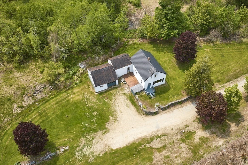 6 Mougin Road Cummington, MA 01026 - Photo 4 of 26 a view of a swimming pool with an outdoor seating and yard