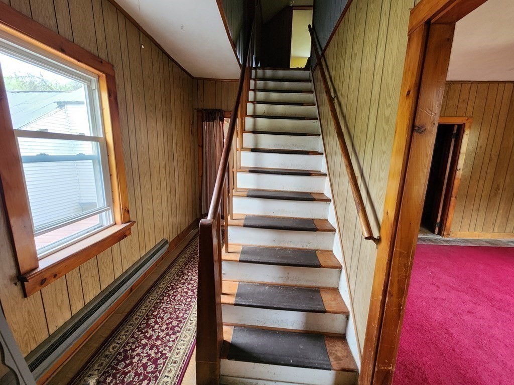 6 Mougin Road Cummington, MA 01026 - Photo 6 of 26 a view of staircase with wooden floor and windows
