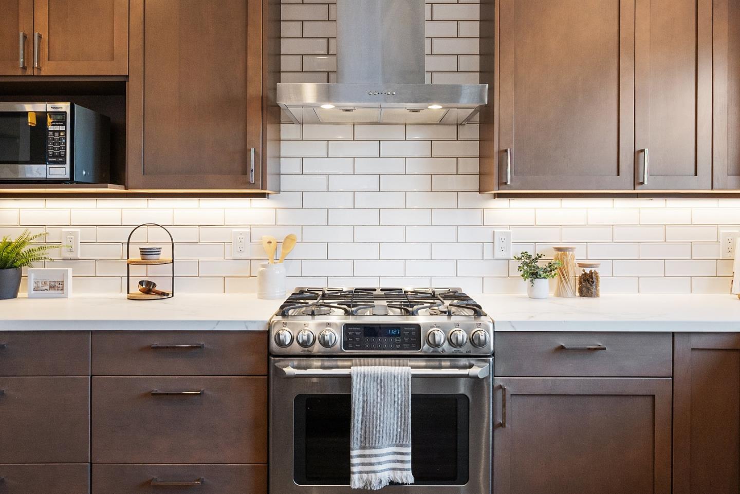 260 Willow Avenue Millbrae, CA 94030 - Photo 19 of 31 a kitchen with granite countertop a sink a stove and cabinets