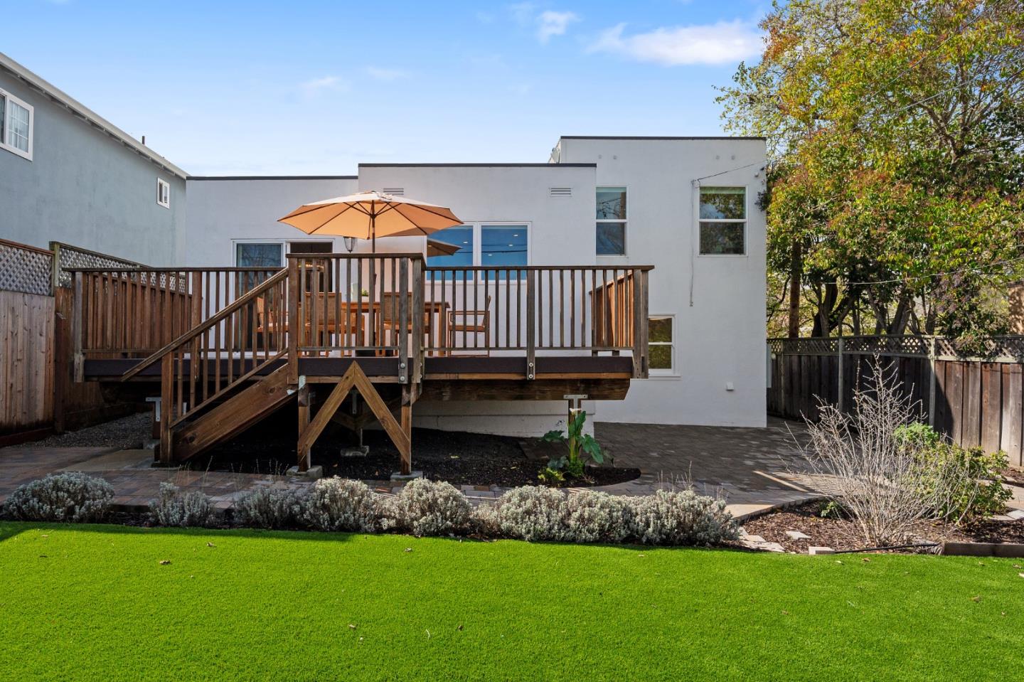 260 Willow Avenue Millbrae, CA 94030 - Photo 29 of 31 a view of a house with a small yard and a swimming pool