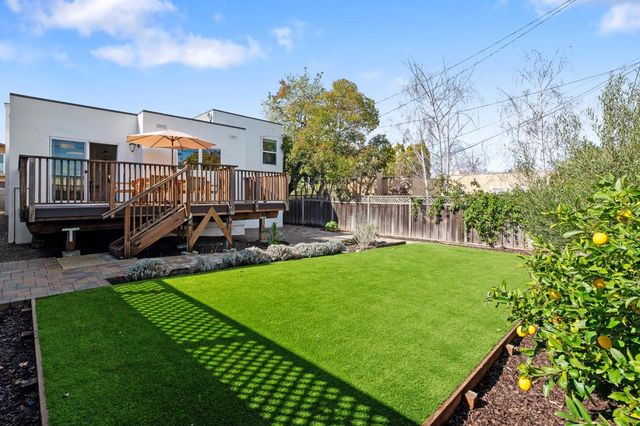 a view of a garden with a slide