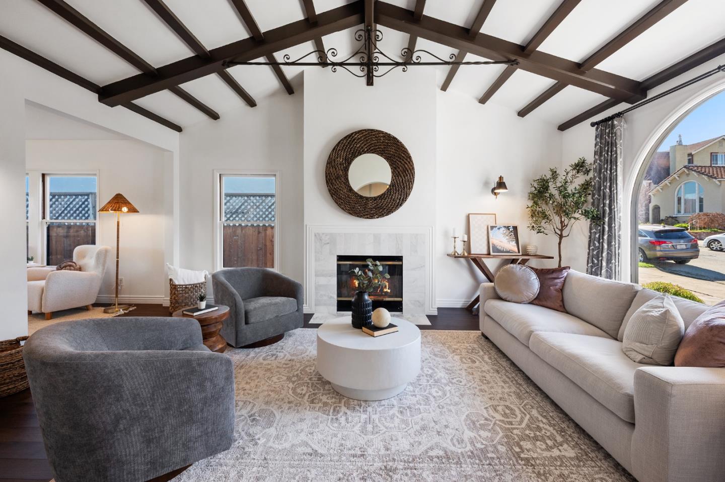 260 Willow Avenue Millbrae, CA 94030 - Photo 6 of 31 a living room with furniture a fireplace and a table