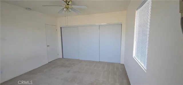a view of wooden floor in front of a house