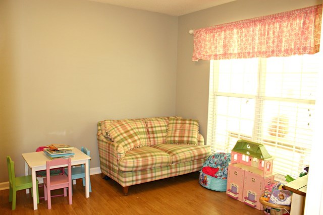 1935 Reedy Creek Road Forsyth, GA 31029 - Photo 8 of 14 a bedroom with a bed and a window