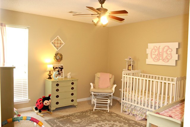 1935 Reedy Creek Road Forsyth, GA 31029 - Photo 10 of 14 a bedroom with a bed and wooden floor