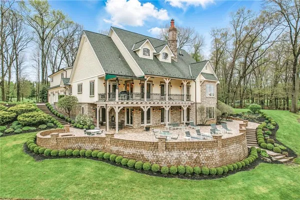 a view of a house with a swimming pool