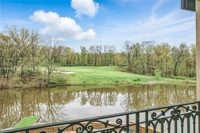 a view of a lake with a big yard