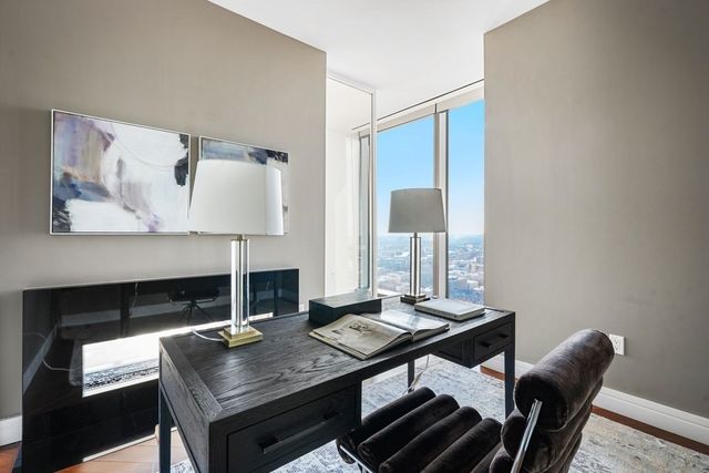 a view of a workspace with furniture