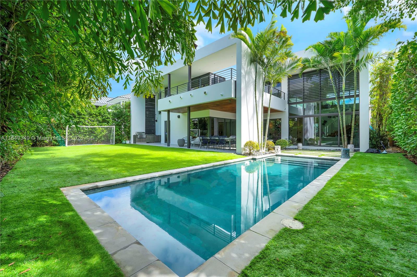 7900 Southwest 54th Avenue Miami, FL 33143 - Photo 1 of 63 a view of a house with a swimming pool