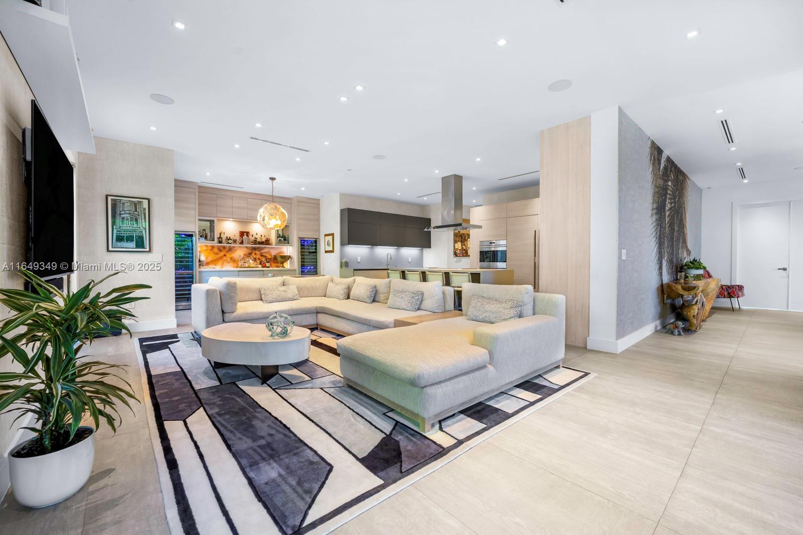 7900 Southwest 54th Avenue Miami, FL 33143 - Photo 18 of 63 a living room with furniture and a potted plant