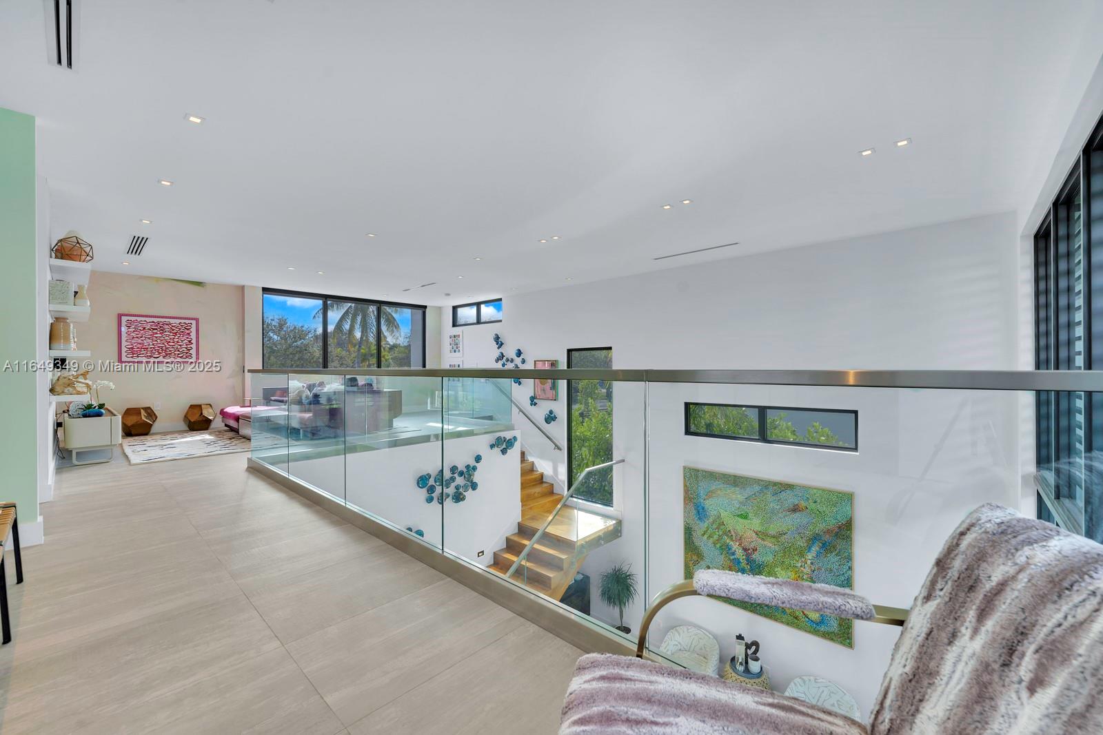 7900 Southwest 54th Avenue Miami, FL 33143 - Photo 42 of 63 a living room with furniture and a table