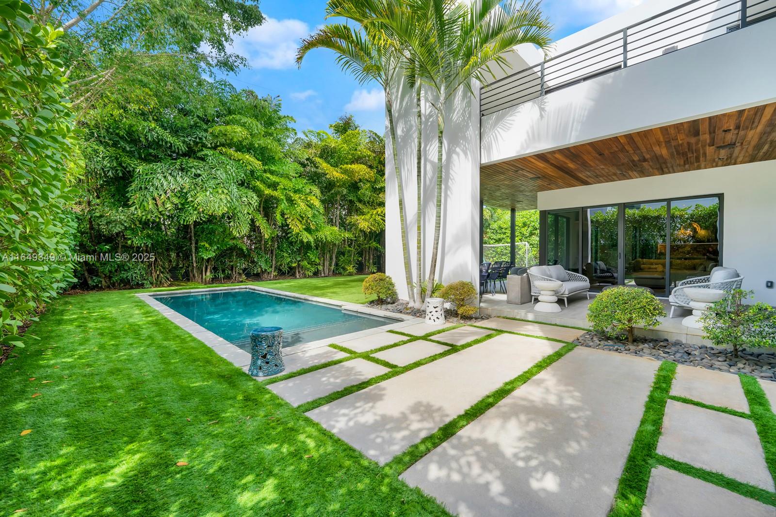 7900 Southwest 54th Avenue Miami, FL 33143 - Photo 56 of 63 a view of a house with swimming pool and sitting area
