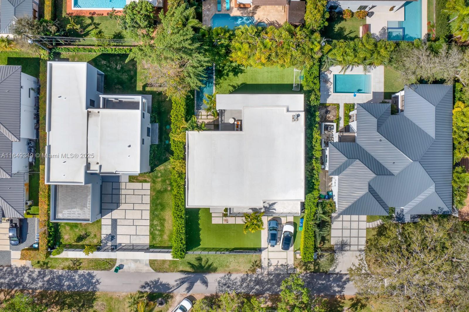 7900 Southwest 54th Avenue Miami, FL 33143 - Photo 63 of 63 an aerial view of a house with a yard and table and chairs